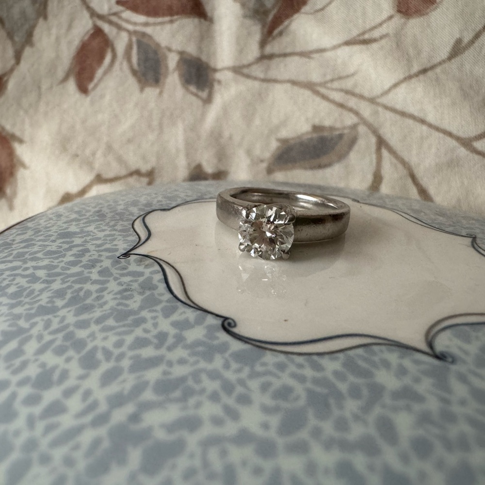 Solitaire diamond and platinum engagement ring, sz3.75-4